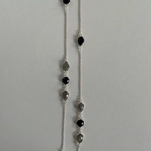 Strand of crystals on long silver chain